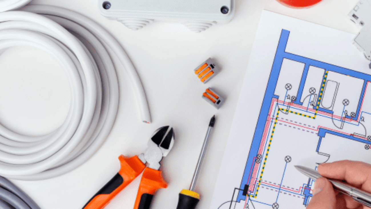 electrician-checking-electrical-plans-concept-repair-electrical-equipment 1-min